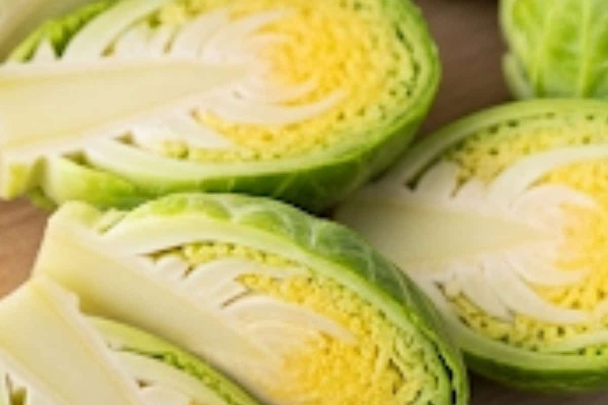 Slice the brussel sprouts in half lengthwise. 