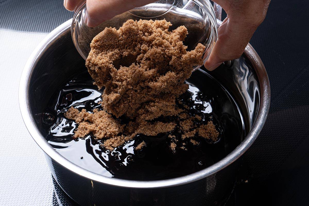 balsamic glaze with brown sugar being poured in