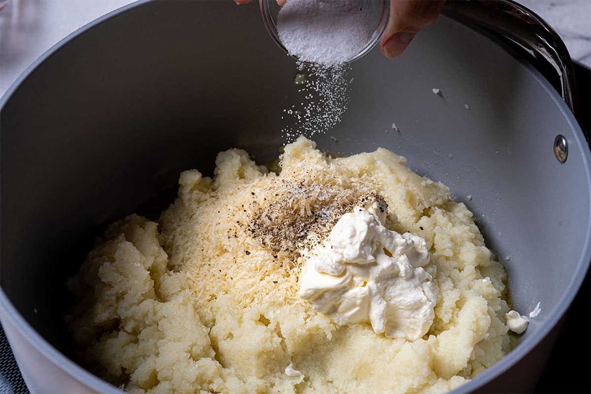 An image shows salt, pepper, and sour cream being added.