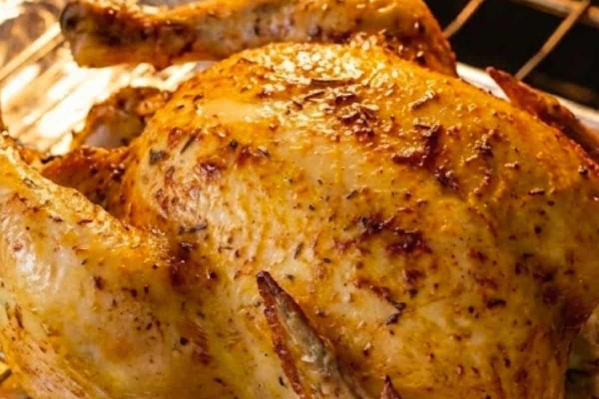 Transfer chicken to a foil-lined tray with a rack, brush with olive oil,
