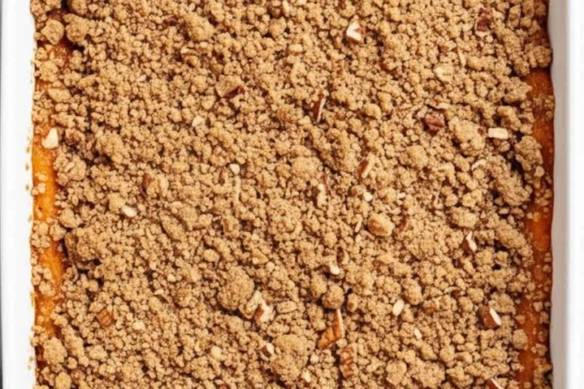 Sprinkle the pecan mixture evenly over the sweet potatoes and dust with cinnamon sugar.