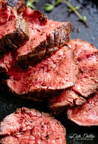 The best, juicy roast Beef Tenderloin slathered with garlic butter that melts in your mouth with every bite! Even better when served with a rich and rustic, easy to make red wine sauce (or jus).