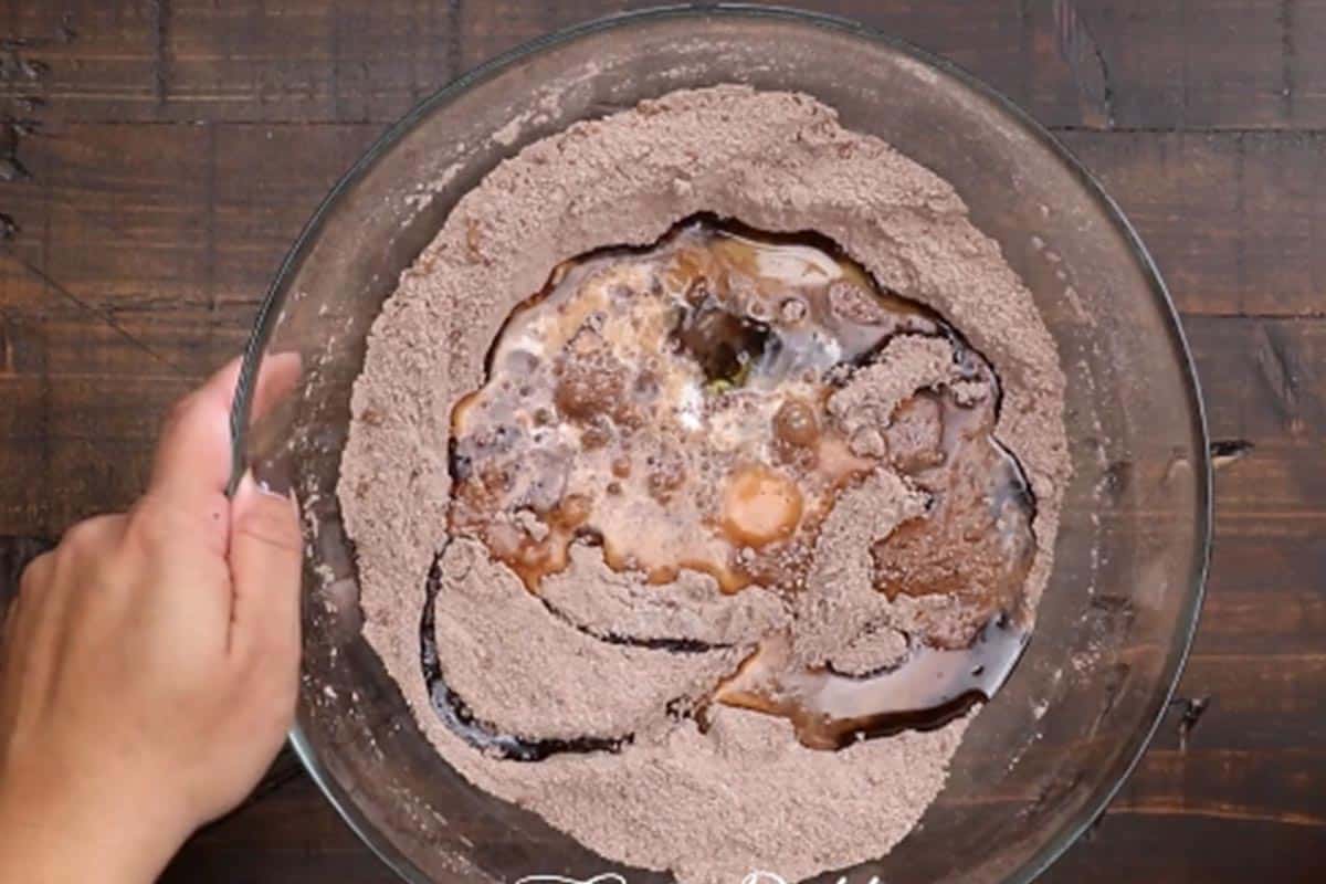 Added the oil, egg, vanilla, and milk to the dry mixture.