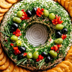 Christmas Bacon Cheese ball Wreath Full of crispy bacon, cheese, chives and onions decorated with biscuits