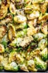 Cheesy Garlic Roasted Brussels Sprouts Recipe caramelized and topped with melted mozzarella cheese! | cafedelites.com