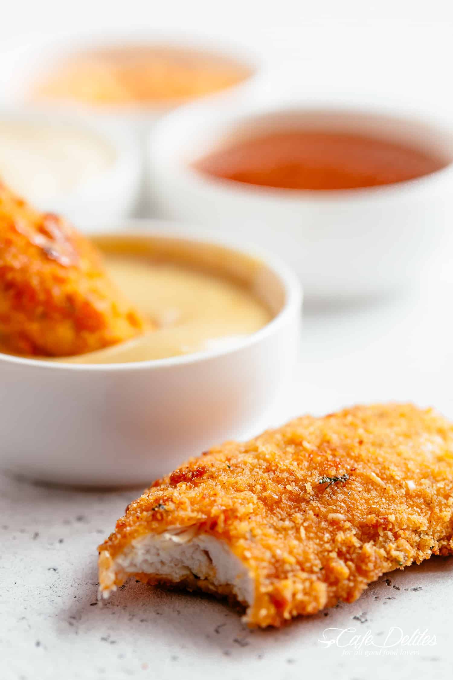 Crispy Baked Chicken Tenders soaked in lemon garlic flavours Chicken Tenders (Lemon Garlic Parmesan)