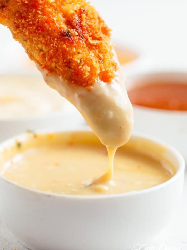 Chicken Tenders in lemon garlic flavors and a golden parmesan dipped in Honey mustard sauce