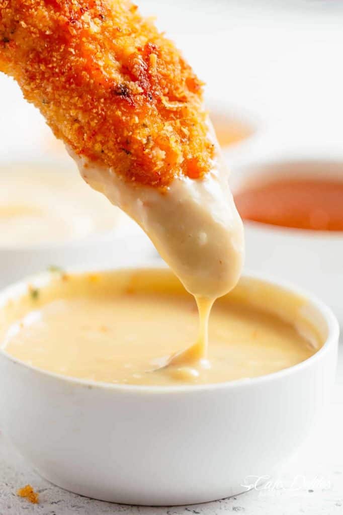 Chicken Tenders in lemon garlic flavours and a golden parmesan. Honey mustard sauce | cafedelites.com