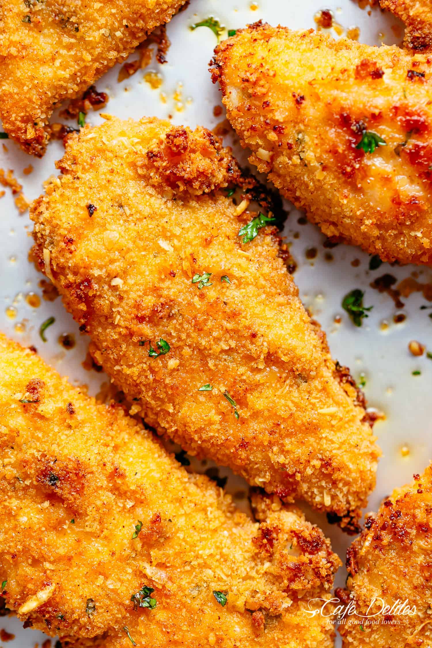 Chicken Tenders in lemon garlic flavours and a golden parmesan Panko crumb! With honey mustard sauce | cafedelites.com