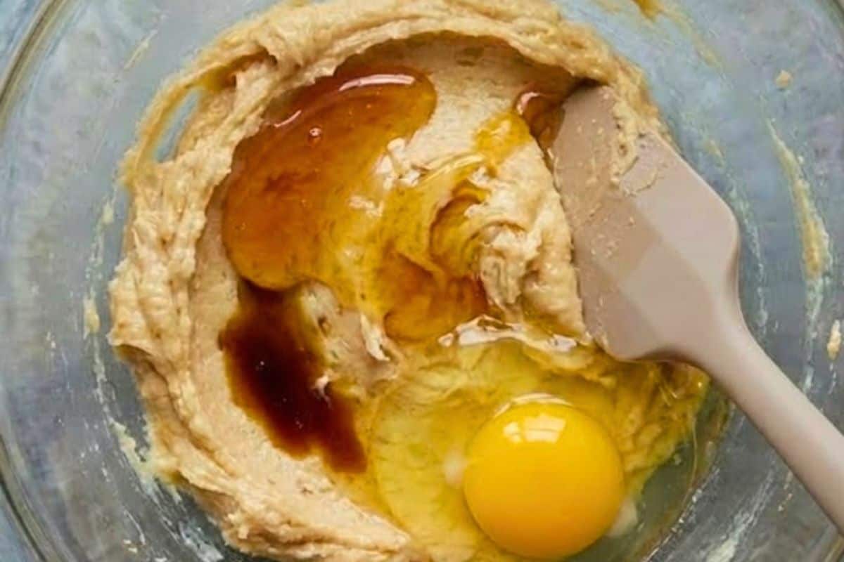 Beat the butter with the sugars until creamy, making sure the sugar has dissolved. Mix in the golden syrup, vanilla, and egg