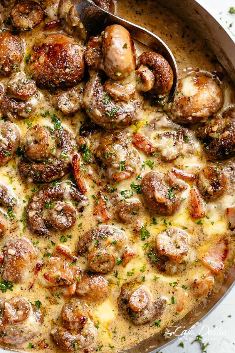 Sautéed Mushroom recipe with cheese, cream and bacon in a skillet | cafedelites.com