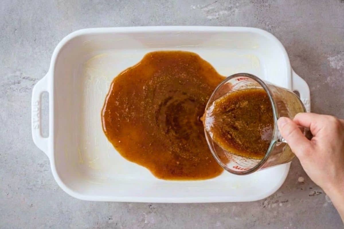 Melt butter, stir in 1 cup brown sugar, then spread evenly across the bottom of the dish.