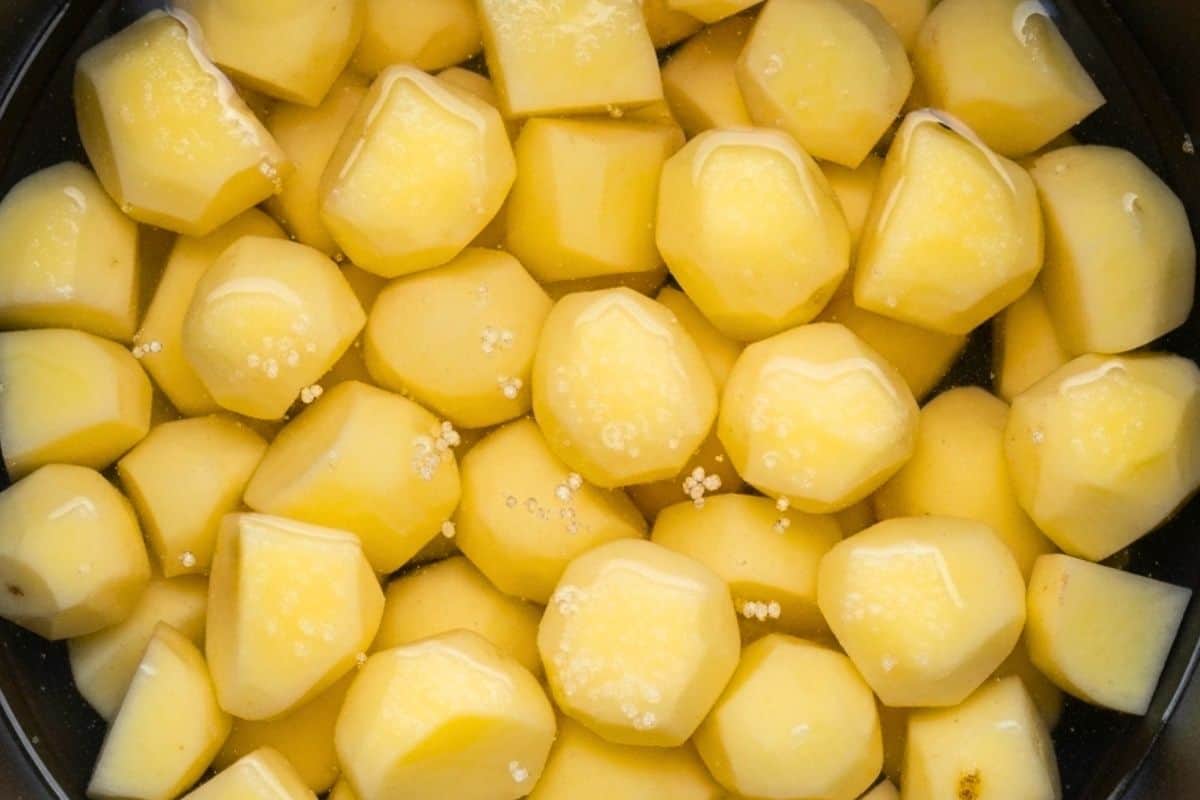 Peel potatoes, cut into large chunks, and cover with cold salted water and boil for 20 minutes.