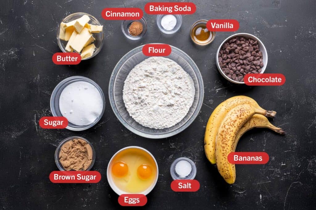 image of all the ingredients required for the preparation of this recipe, specifically: flour,cinammon, baking soda, vanilla, chocolate, bananas, salt, eggs, brown sugar, sugar, and butter.