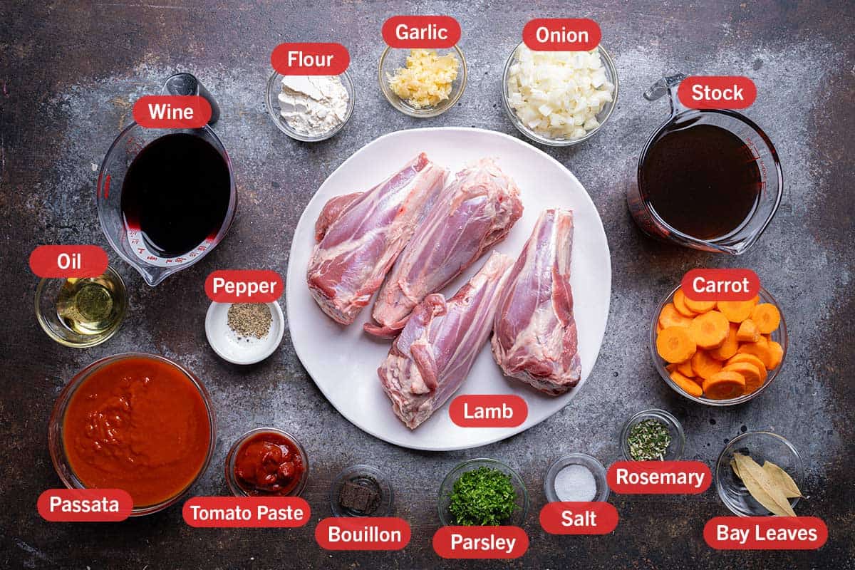 ingredients laid down from a top view against a dark white and black background.