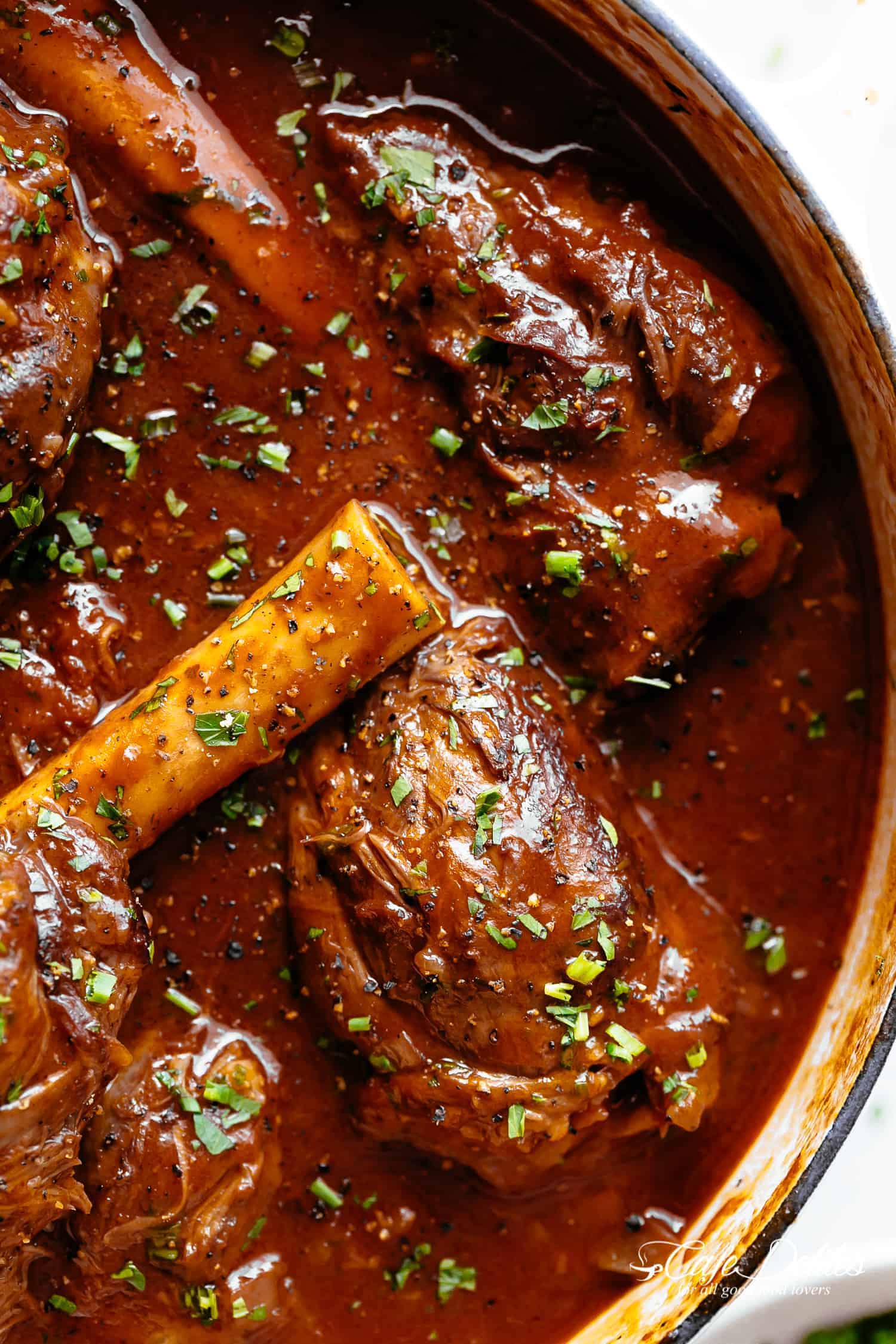 Tender, fall off the bone easy braised Lamb Shanks in the oven, stove top, slow cooker or Instant pot.