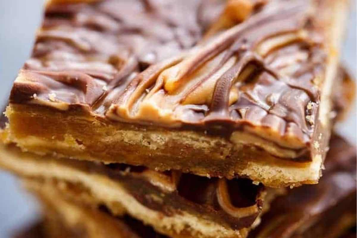 Scatter the peanut butter chips over the chocolate and let it sit for 2 minutes, then swirl with a fork.