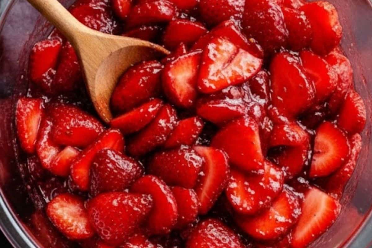 Toss the sliced strawberries in a large bowl with the melted jelly - 3