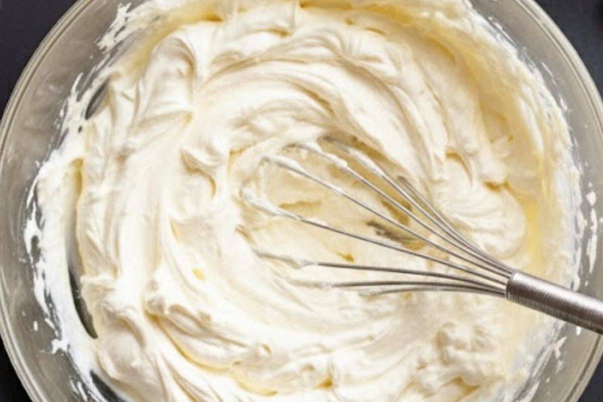  In a bowl, beat together the cream cheese and sugar until smooth. Slowly add the whipping cream and vanilla - 5