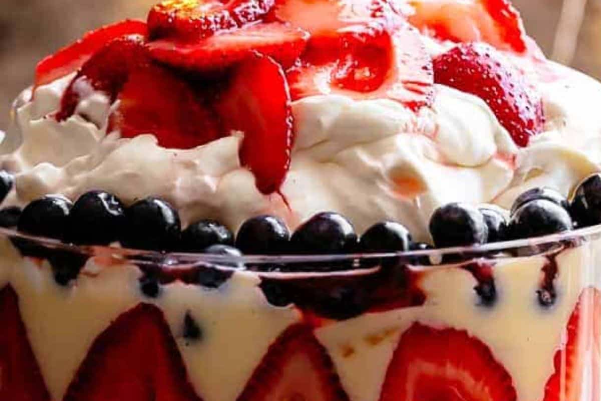 Repeat with the remaining pancakes, custard, cream cheese filling, and strawberries, creating even. - 7