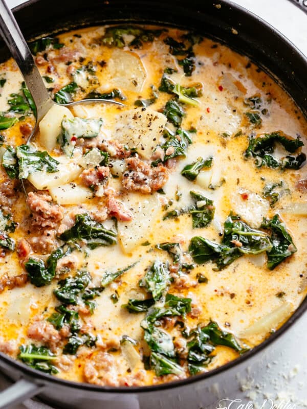 Creamy Zuppa Toscana full of crumbled sausage, crispy bacon and tender potatoes in a creamy broth!