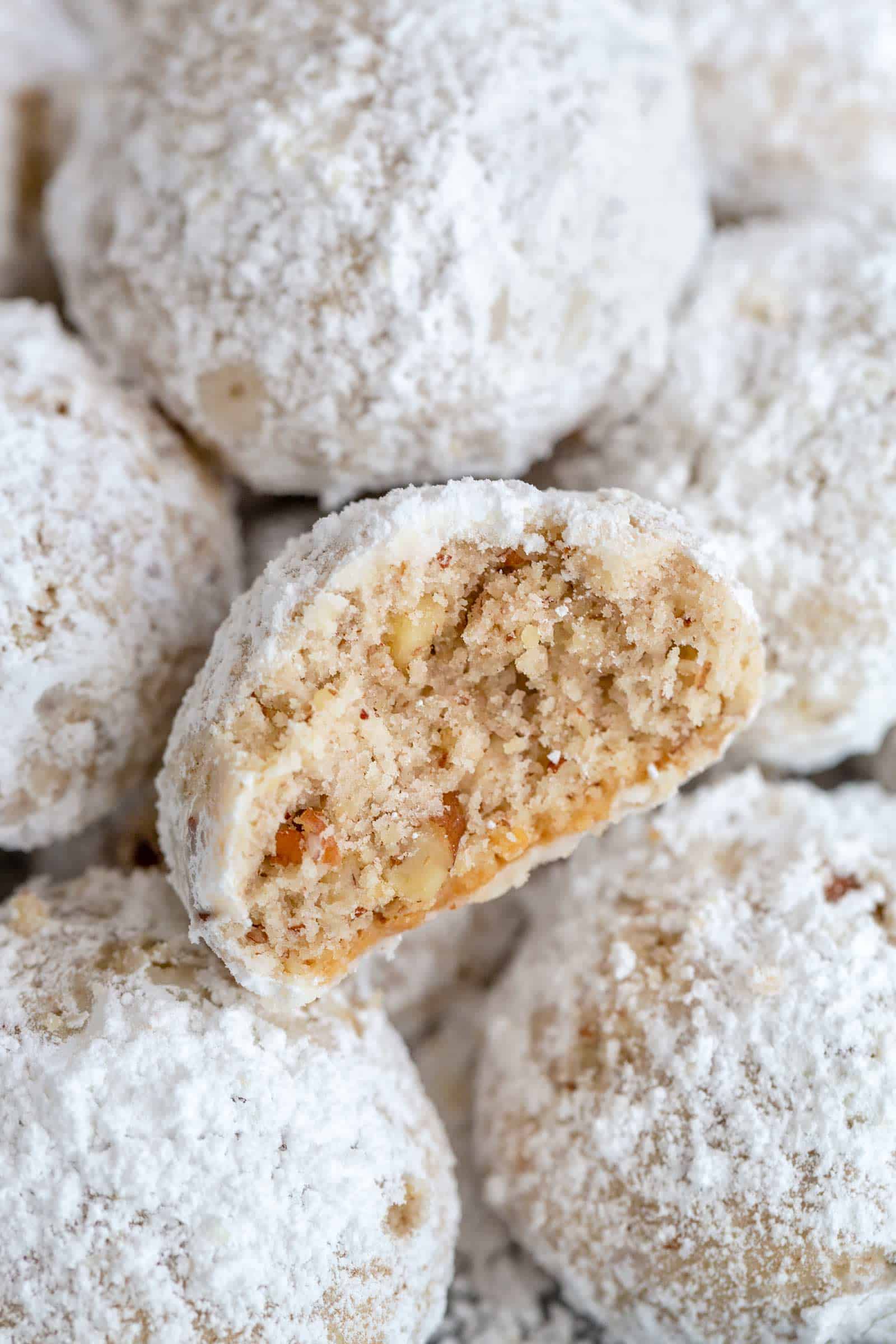 christmas cookie balls rolled in powdered sugar