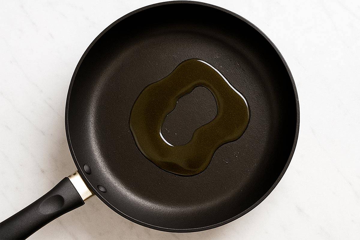 empty pan with oil being heated