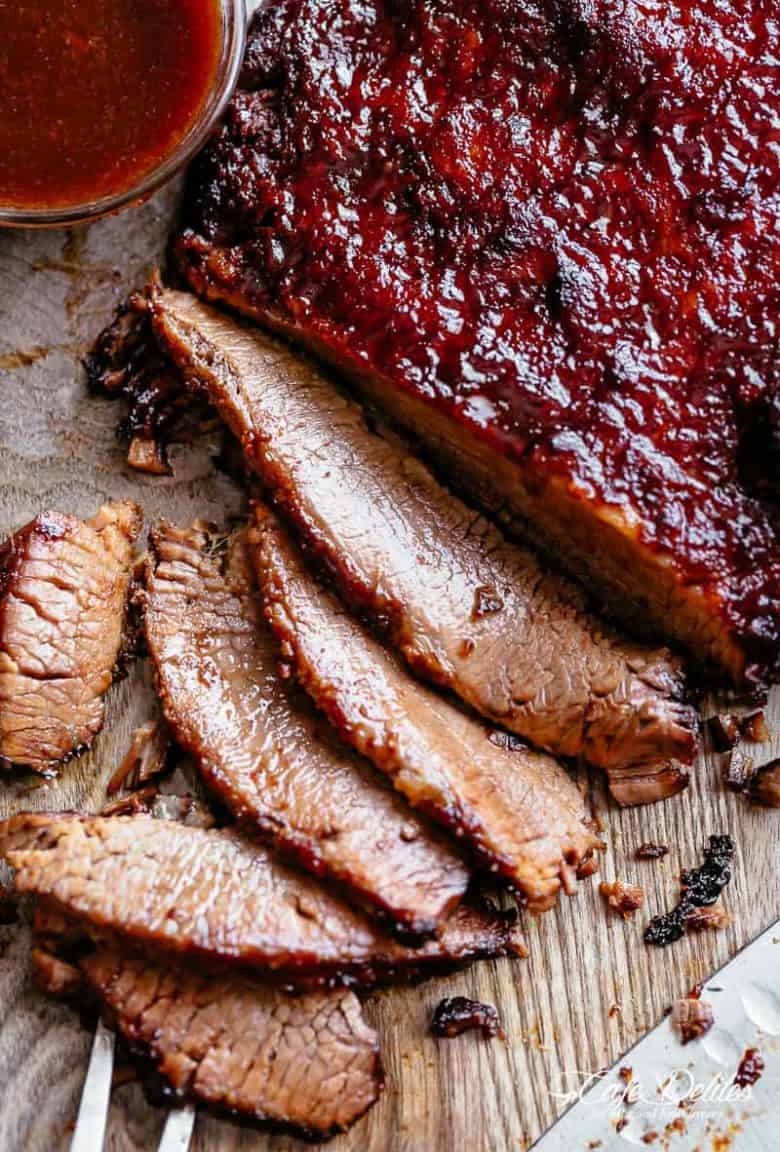 Juicy Beef Brisket cooked low and slow until tender, basted in a mouthwatering barbecue sauce with a kick of garlic and optional heat! | cafedelites.com