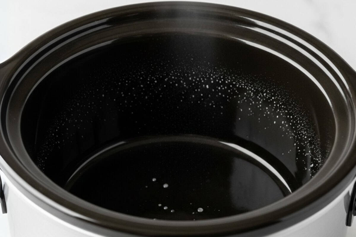 Spray the slow cooker with cooking spray before putting the beef brisket.