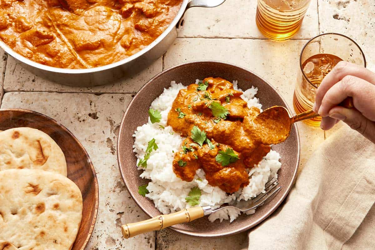 Butter Chicken on a bed of rice.