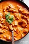 A super easy, full flavoured Butter Chicken with aromatic golden chicken pieces in an incredible curry sauce. | cafedelites.com