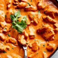 A super easy, full flavoured Butter Chicken with aromatic golden chicken pieces in an incredible curry sauce. | cafedelites.com