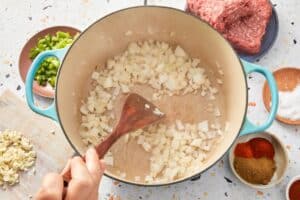 cooked aromatics in a pot with olive oil