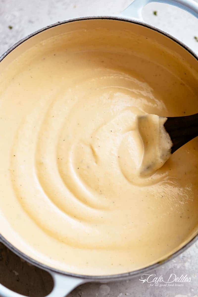 Creamy Cauliflower Soup is low carb and blended with cream. | cafedelites.com