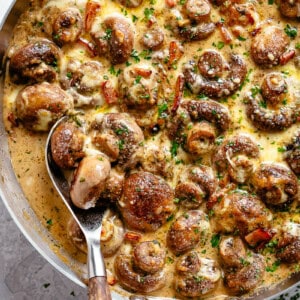 Creamy Garlic Mushrooms and Bacon in a pan