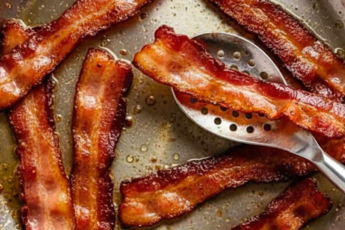 Cook the bacon in a large oven-safe skillet over medium heat until crispy.