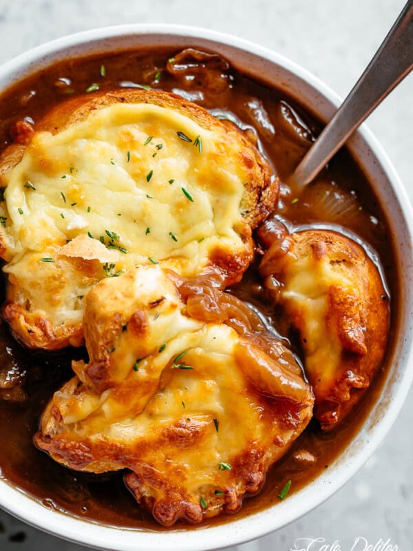 Classic French Onion Soup finished off with garlic bread and two types of melted cheese