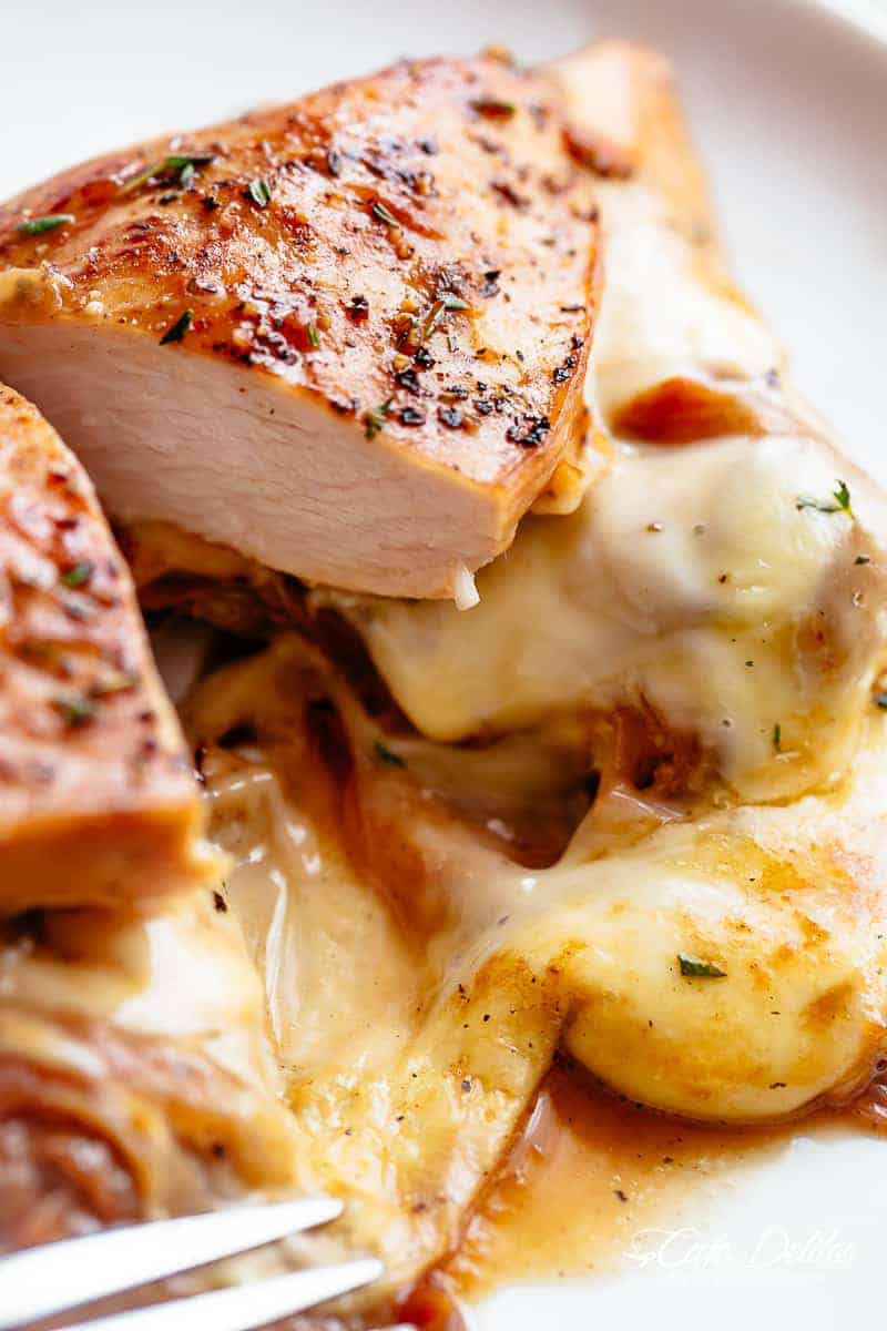 French Onion Stuffed Chicken Casserole makes for a delicious dinner! Juicy, succulent chicken breasts stuffed with caramelized onions and glorious melted cheese. | cafedelites.com