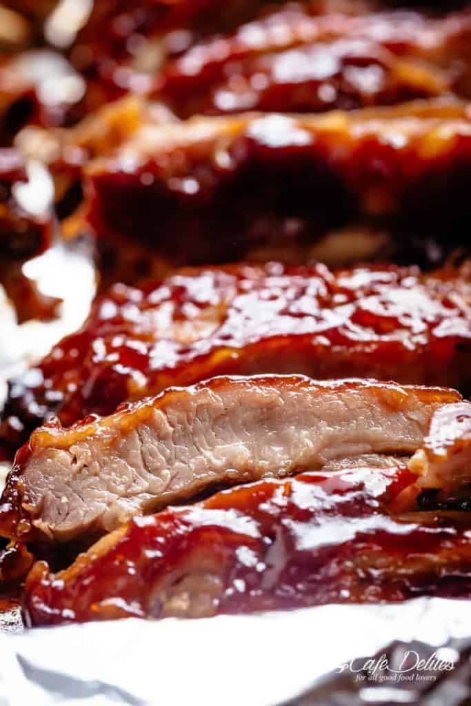 Close up of tender meat glazed in a rich, dark sauce. 