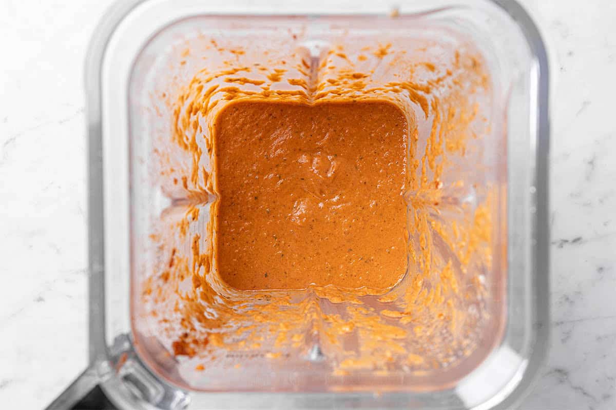 thin sauce being blended