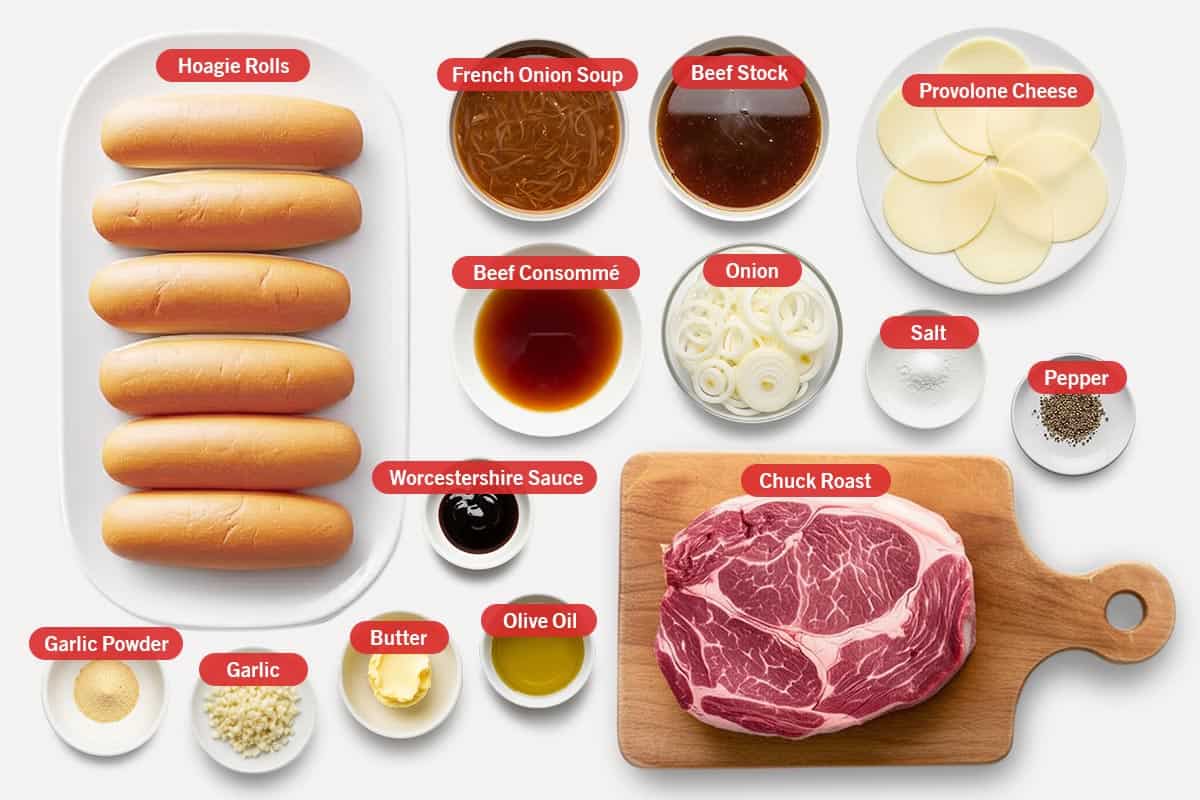 Top shot of ingredients: Hoagie Rolls, French onion soup, beef stock, provolone cheese, beef consommé, onion, salt, pepper, Worcestershire sauce, chuck roast, garlic powder, garlic, butter, and olive oil.