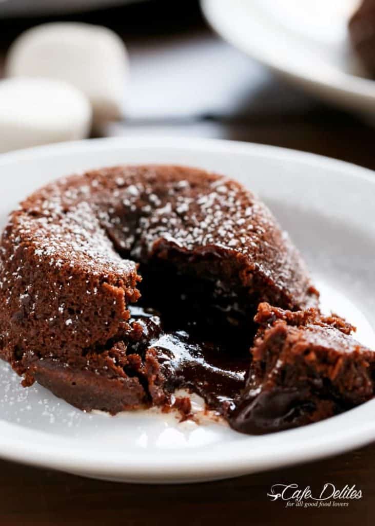 Molten Chocolate Lava Cakes with melted marshmallow in the centre. All baked in a muffin tin...it doesn't get any easier! | cafedelites.com