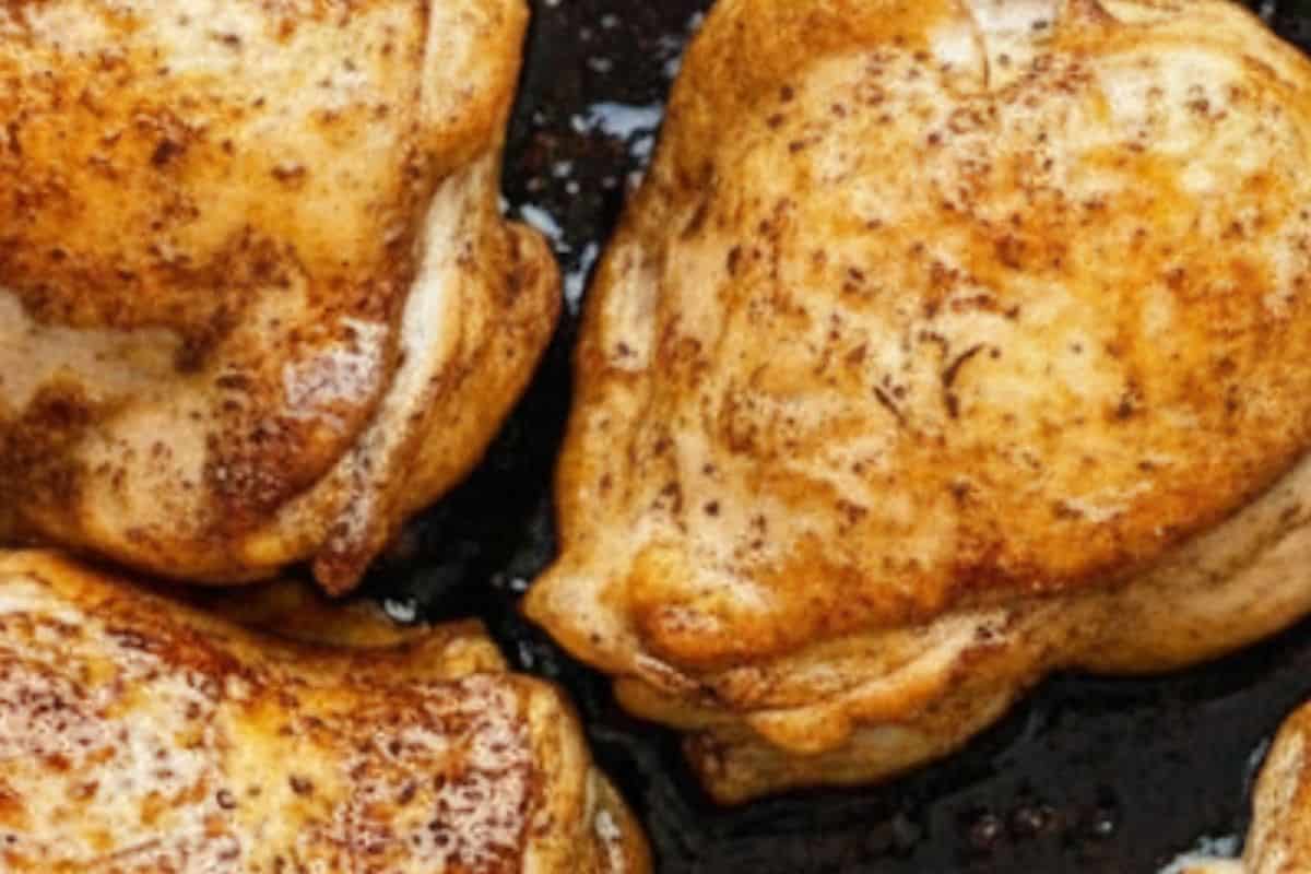 Heat a large oven-proof skillet over medium-high heat with olive oil. Place the chicken skin-side down and sear until golden and crisp.