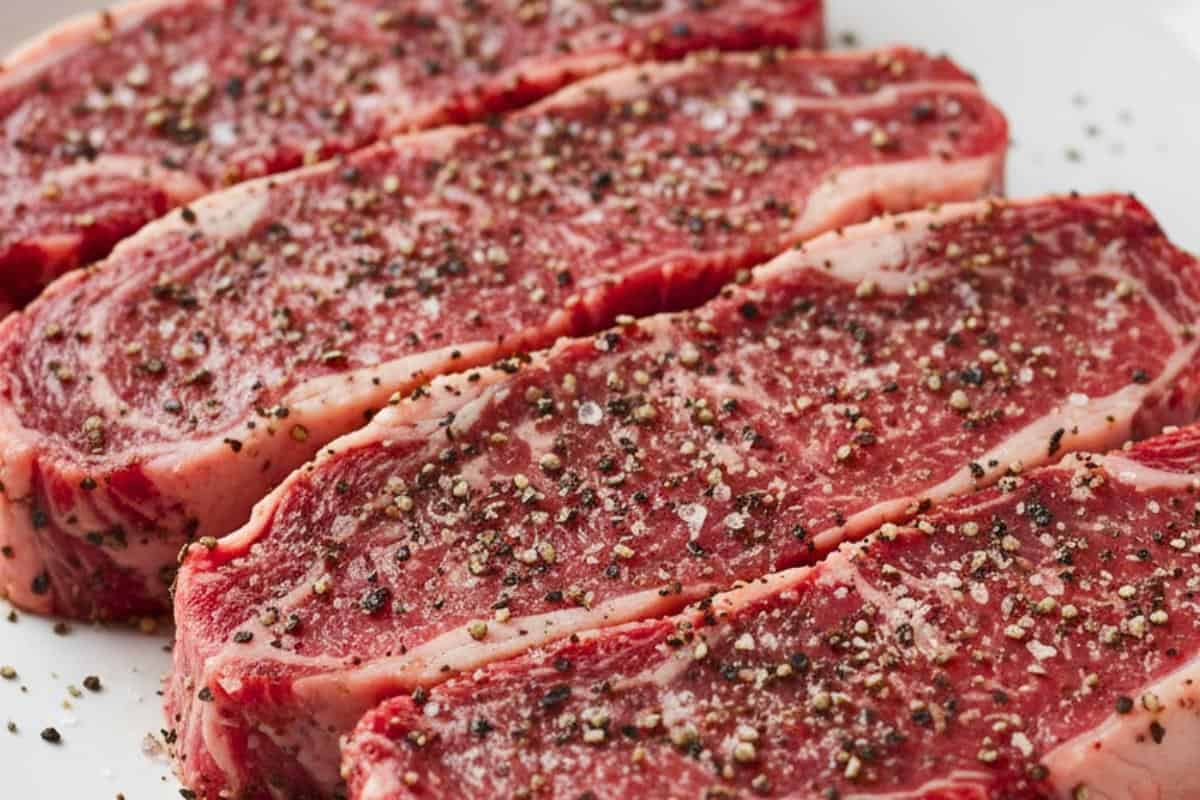 Season the steak with salt and pepper.