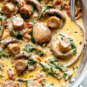 Creamy Garlic Butter Tuscan Mushrooms with spoon