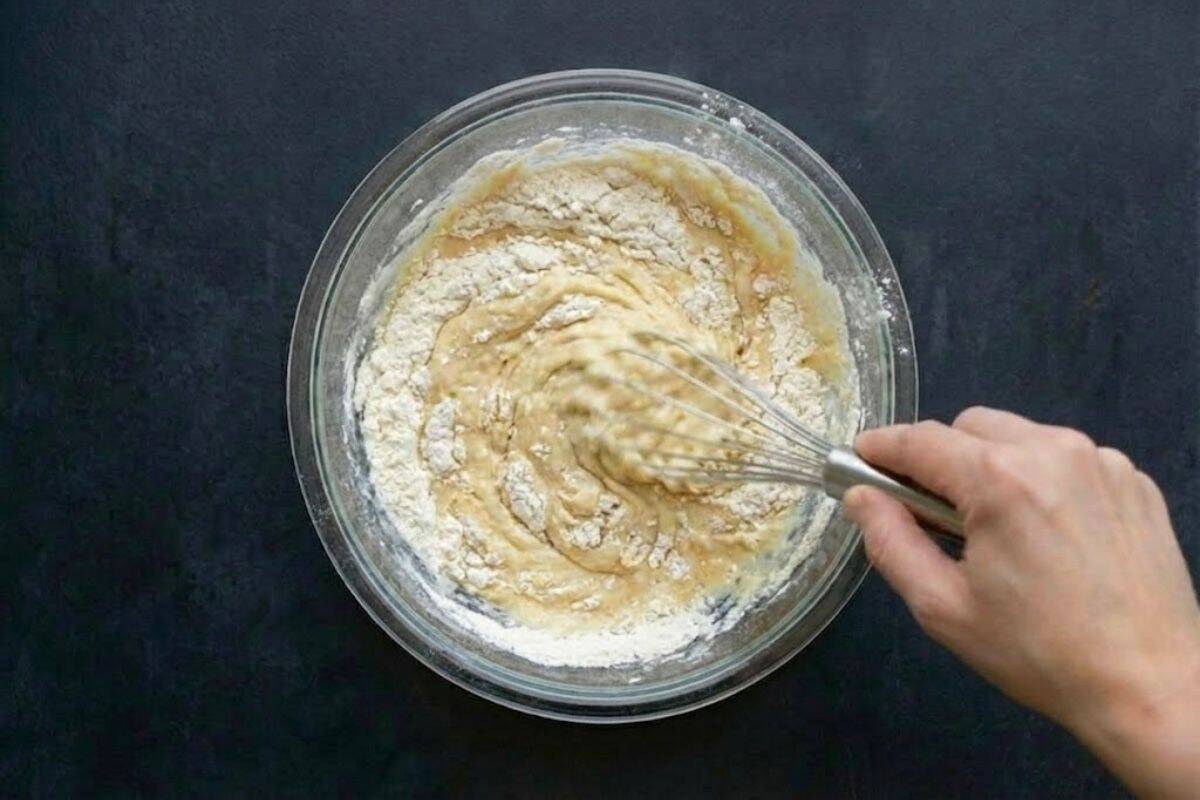Whisk the wet ingredients together first, then slowly fold them into the dry ingredients until mostly smooth