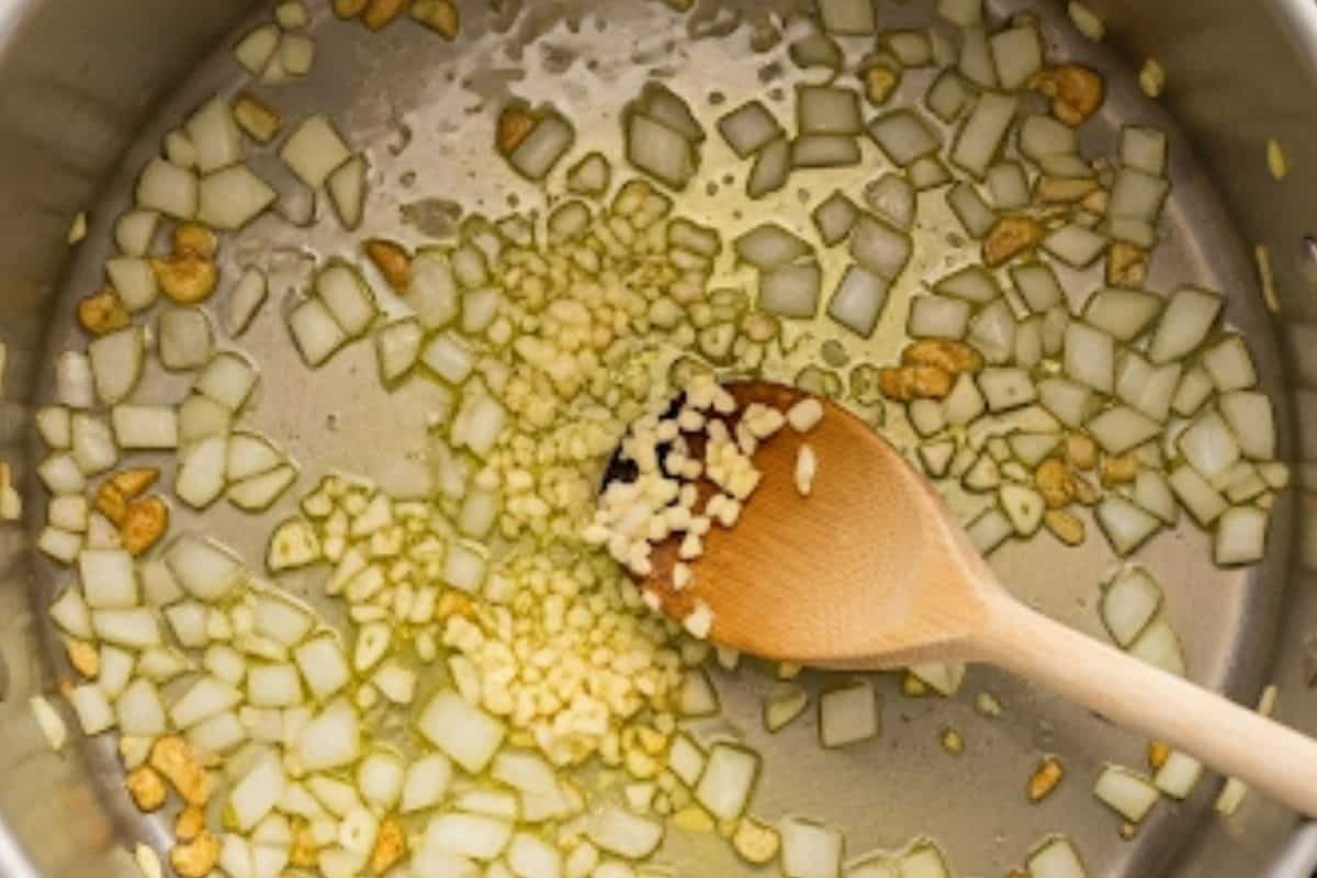 Add the chopped onion and cook until softened, then stir in the garlic and sauté for about 1 minute until fragrant