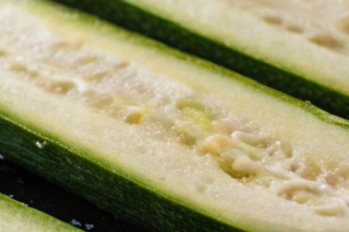 Place halved zucchini cut side up on the sheet in a single layer
