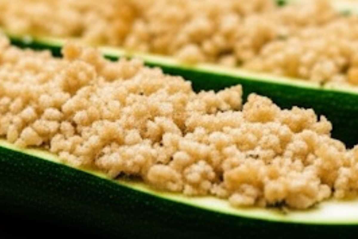 Spoon the mixture evenly over each zucchini half, pressing lightly so it adheres. Mist the crumb topping with a little cooking oil spray