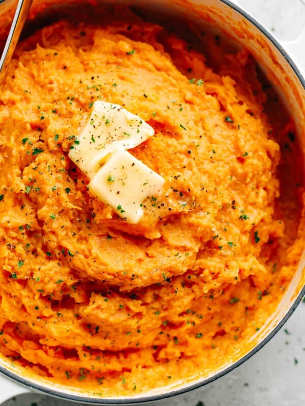 Mashed Sweet Potatoes topped with butter pieces